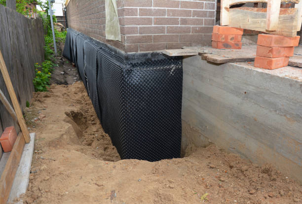SJ Waterproofing Pros technician performing targeted Interior Drainage System assessment in Lyons, GA